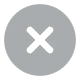 Gray circle with an X inside, resembling a cancel or close icon.